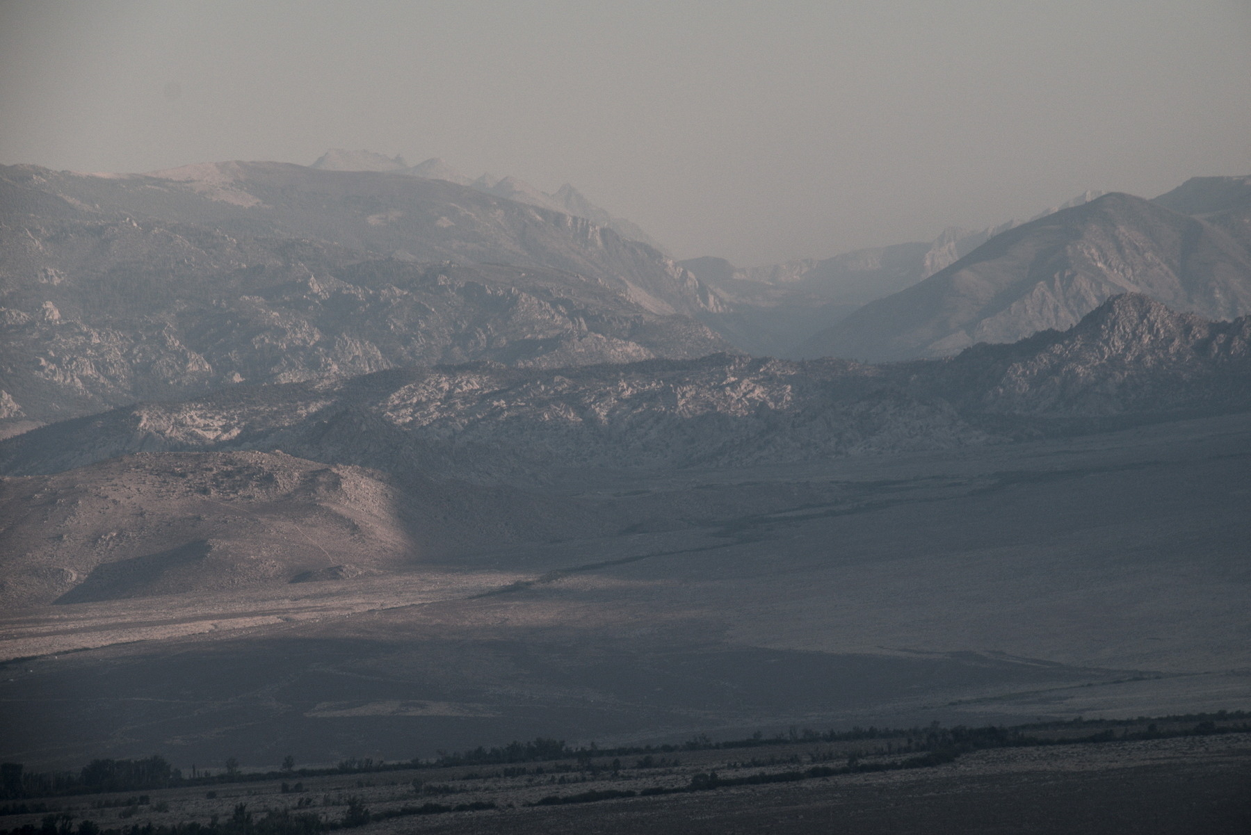 The Buttermilk Hills and eastern Sierra Nevada, obscured by smoke.