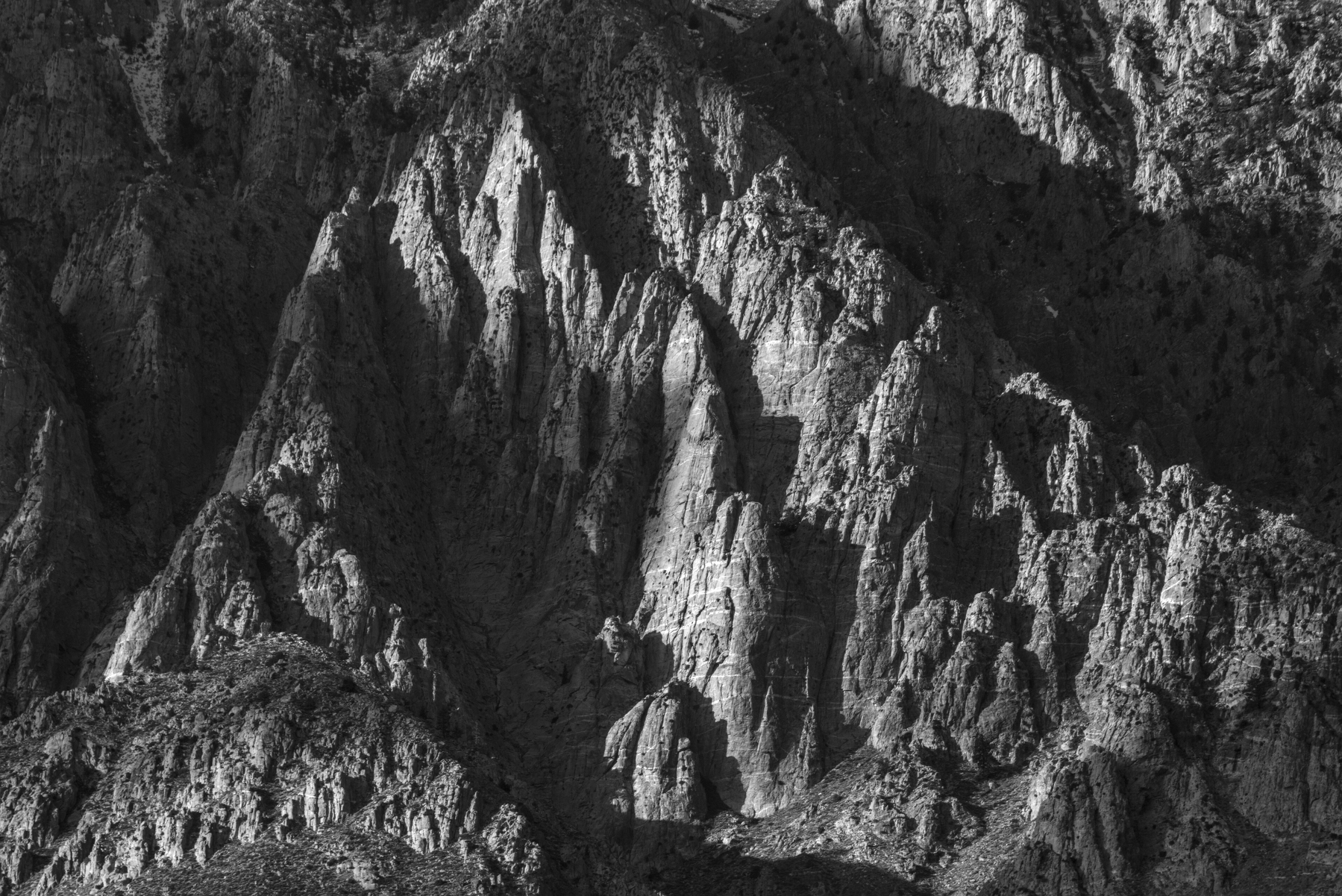 A jagged triangular granite formation.